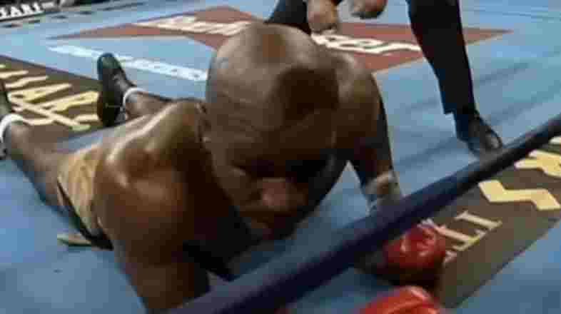 holyfield di pukul jatuh oleh bowe